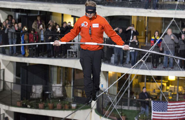 Nik Wallenda walking across the Chicago skyline blindfolded.